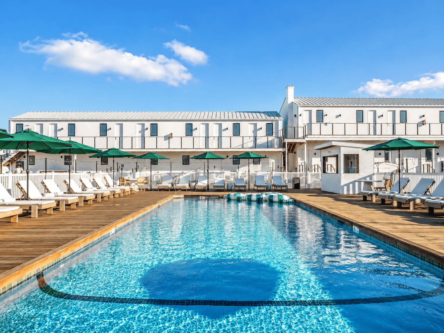 Exterior pool deck at Offshore Montauk, a boutique waterfront hotel and resort in Montauk, New York.